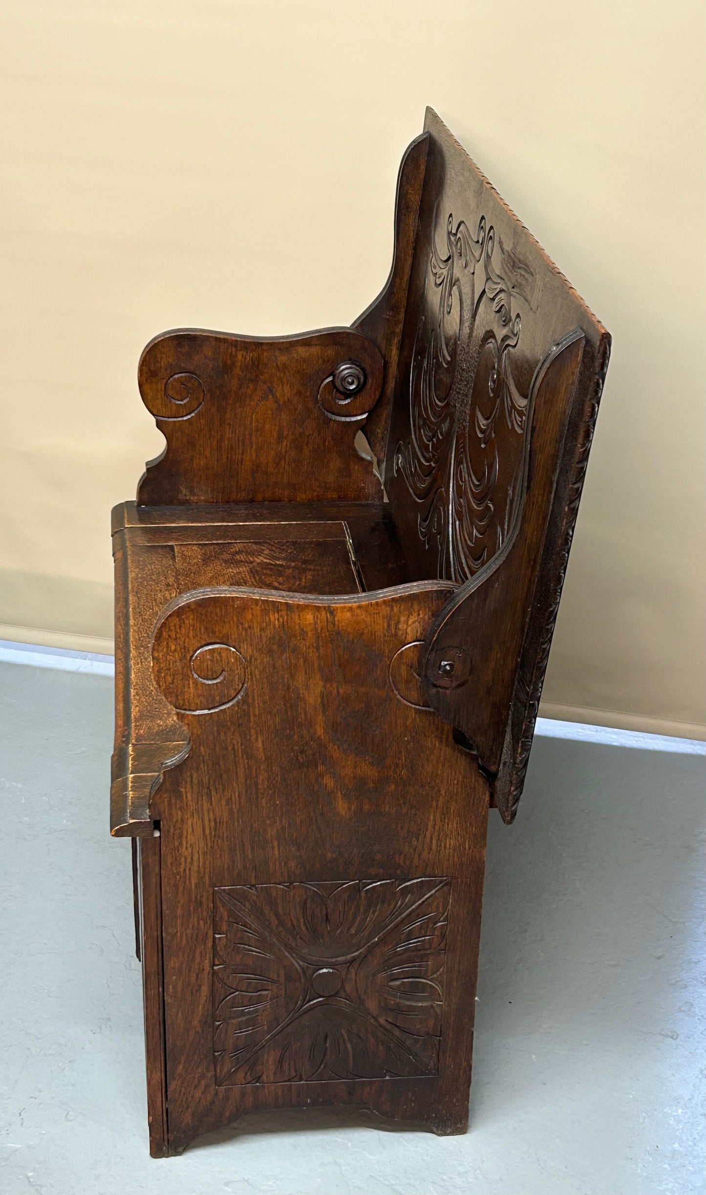 Antique carved monks bench