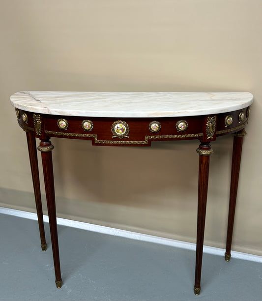 Louis XV1 Style Marble top console table by H and L Epstein.