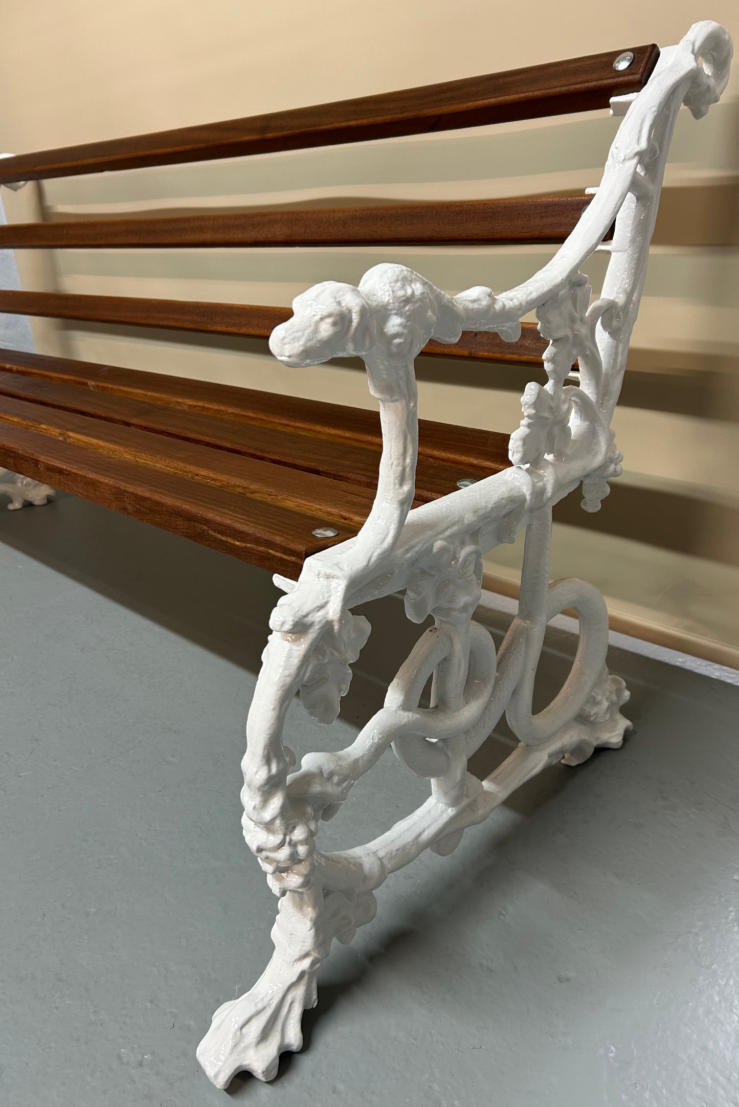 Coalbrookdale style cast iron bench of dog and serpent