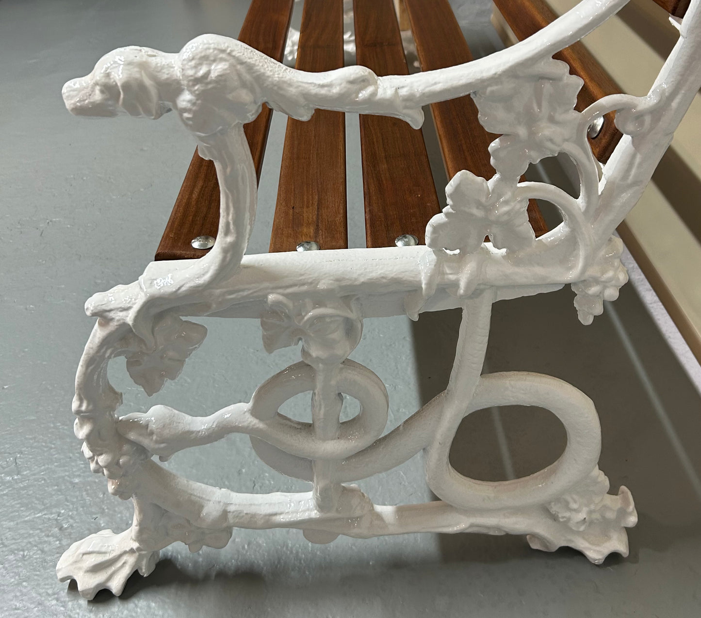 Coalbrookdale style cast iron bench of dog and serpent