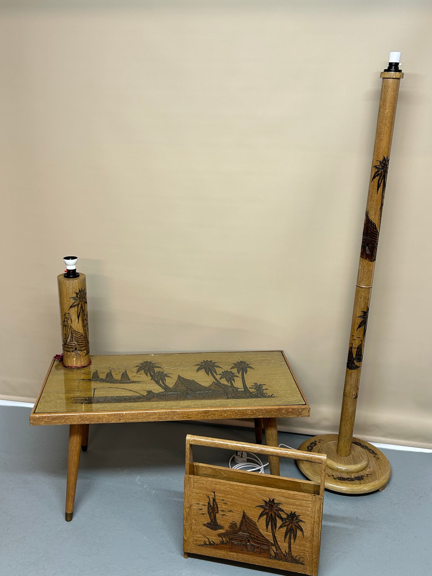 Oriental coffee table with matching lamps and magazine rack