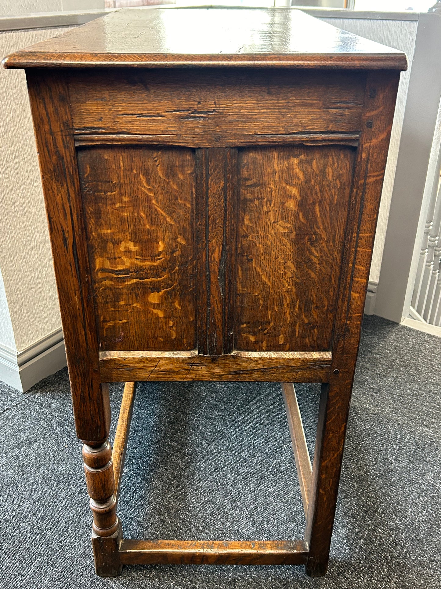 Carved oak side cabinet