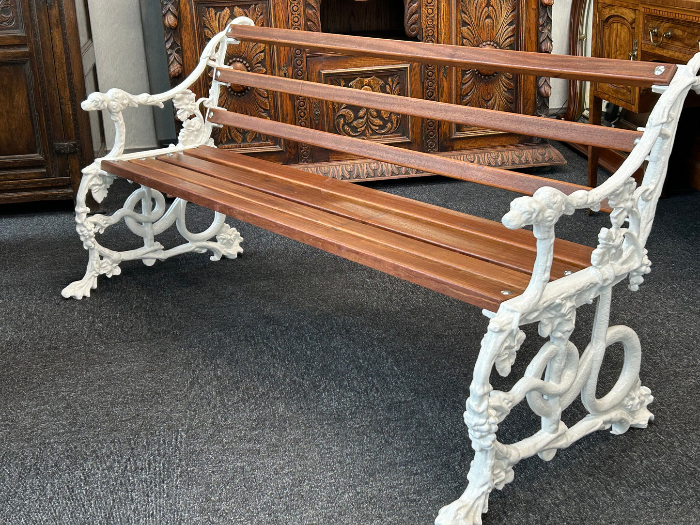 Coalbrookdale style cast iron bench of dog and serpent